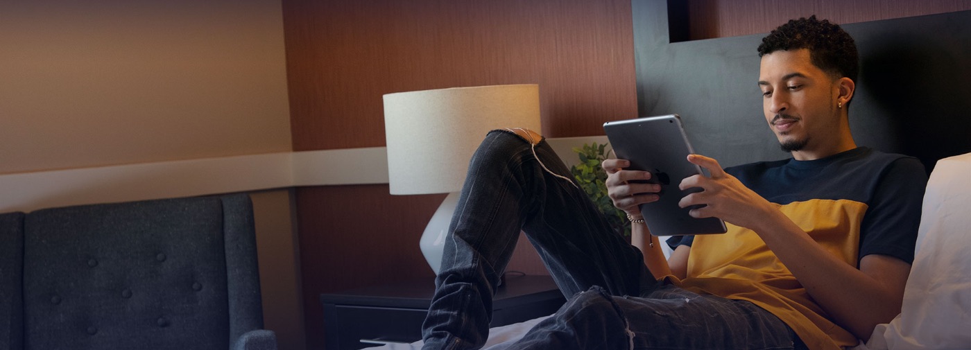 Patient at Sunrise Detox Orlando reading on his bed